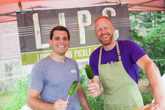 Will Vigliotta and Eamon Leonard offer pickles from the Long Island Pickle Company.
