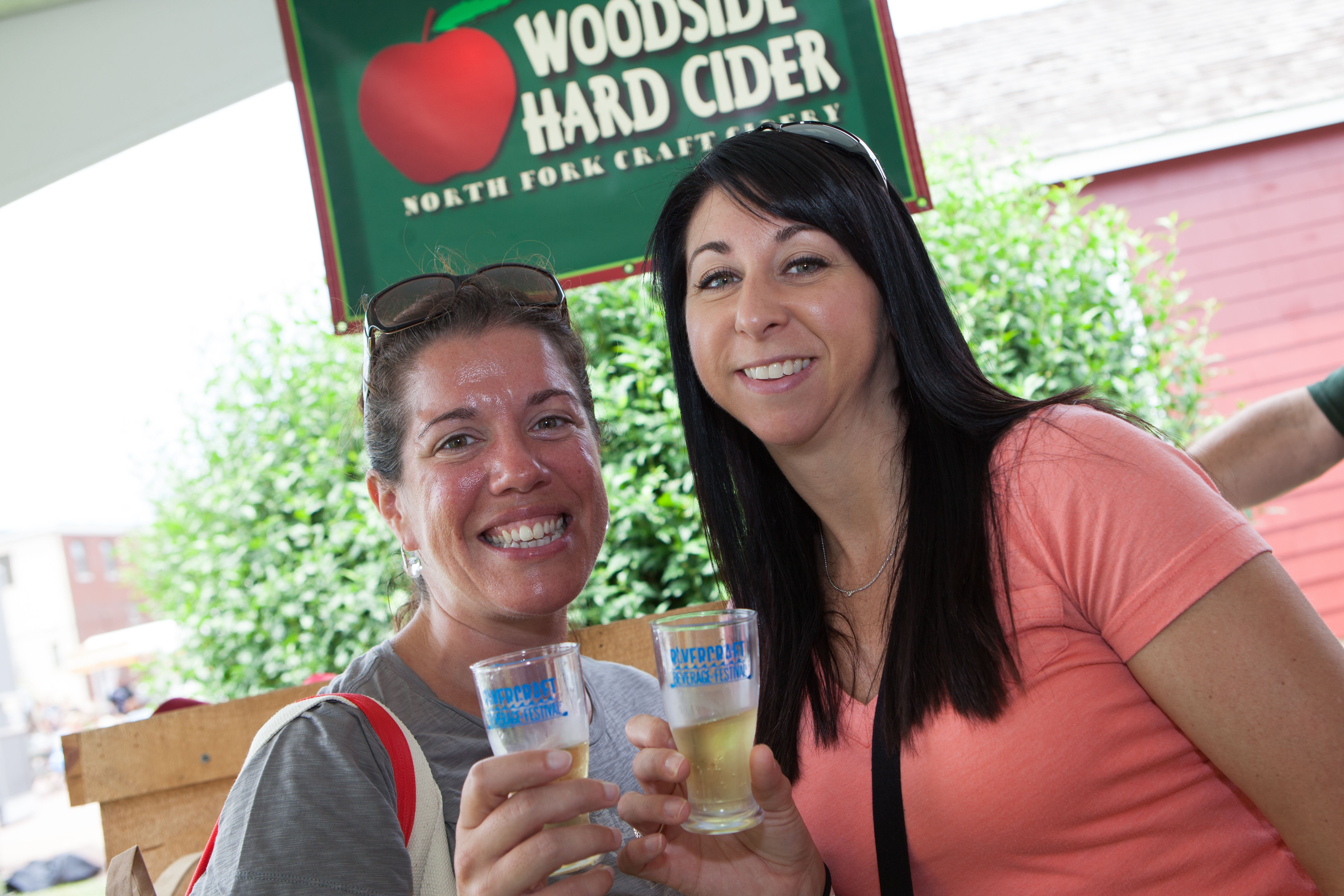 Tina Passolo of Center Moriches and Jen Sauter of Massapequa sample Woodside Hard Cider.