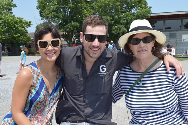 Kalli Prince of Gowanus, Brooklyn, Bill Robins and his mother, Greenport Village Trustee Julia Robins. "I was one of the organizers so I am delighted to see so many people enjoying themselves. I want to thank the tireless efforts of the volunteers and the village staff," Ms. Robins said.