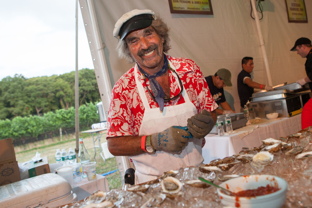 Captain Dave Berson shucks oysters for Noah's.