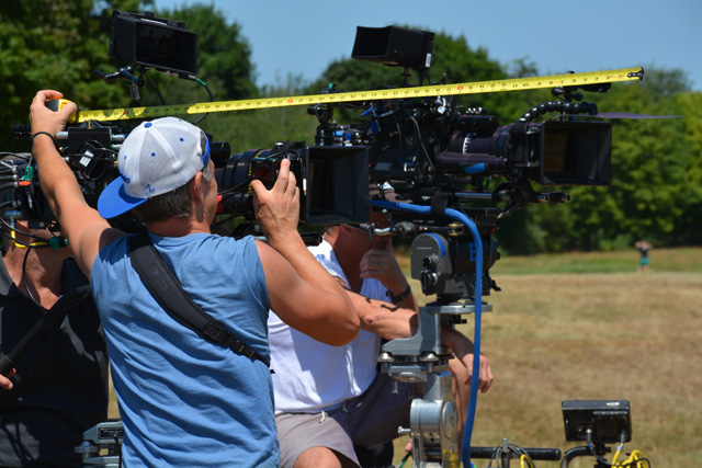 Crews set up to shoot a scene for Royal Pains