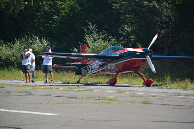 Crew members keep a close eye on the plane used on the set (Credit: Monique Singh-Roy)