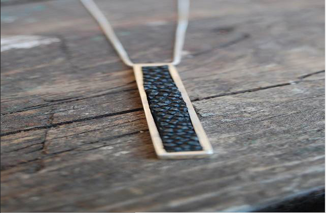 A necklace made of stingray hide and sterling silver from Suess' Common Ground line.