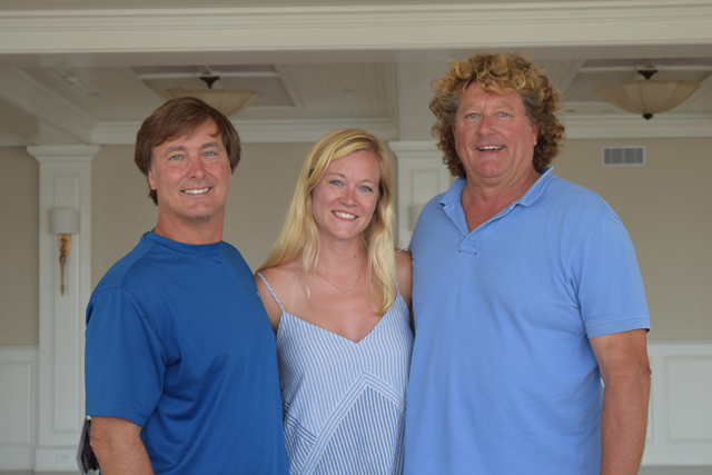 Peconic Bay Yacht Club co-owner John Ingrilli, designer Kate Burger and co-owner Eugene Burger inside the building's ballroom.