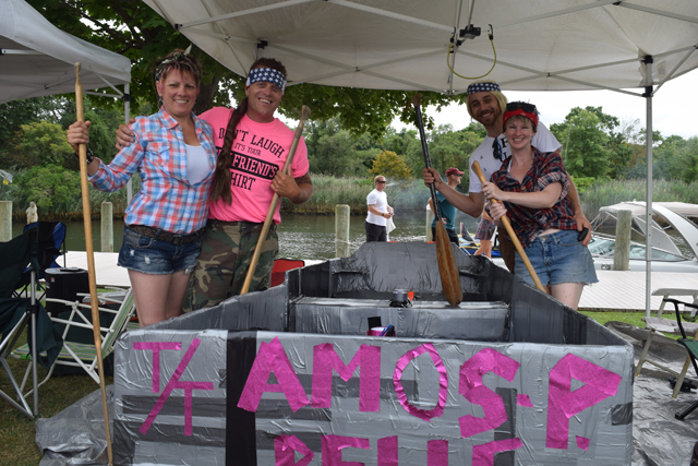 Stephanie Ducharme and Jeff Drum of Lebanon, Conn. and Carrie Wilson and Greg Haddad of Windham Conn. and their boat, "Amos P. Belle."