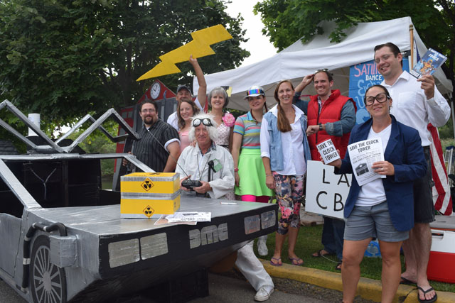 Members of the League of Awesome Cardboard Boat Racers. Tom Lovett as Bif, Chris Paparo of Calverton (holding lightning bolt), Nora Catlin, Lauren Sisson, Mark Sisson as Doc Brown, Katrina Lovett as a typical person from 2015, Amanda Lovett, Chris McHugh of Riverhead as Marty McFly and George McFly.