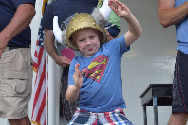 Gavin Walsh of Sayville celebrates his team's win.