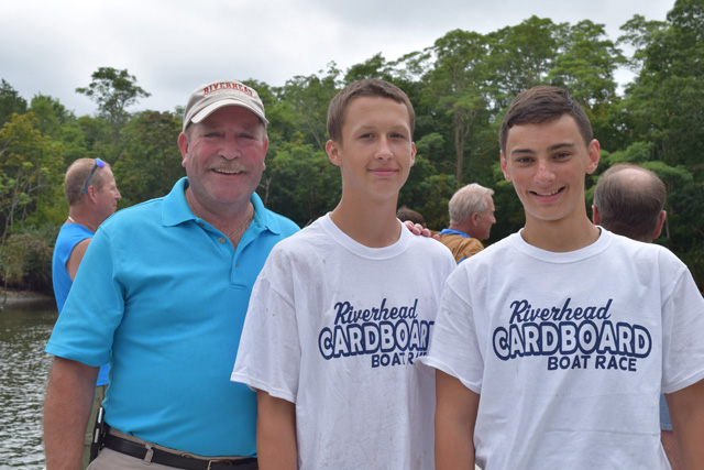Riverhead Town Councilman Jim Wooten with Connor Zaneski and Alex Chiaramonte, both of Riverhead.