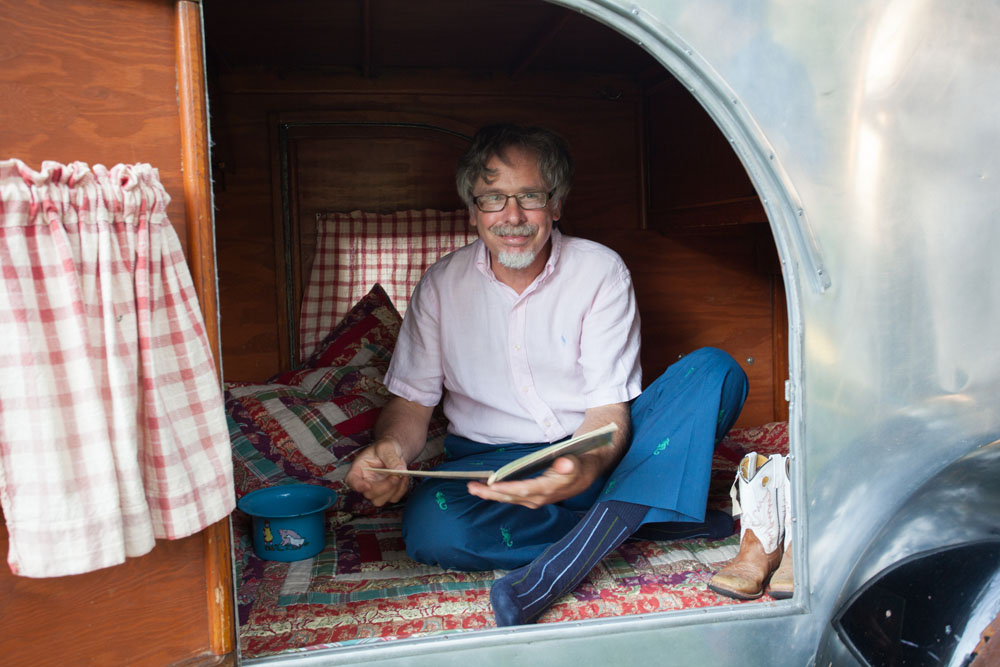 Benja Schwartz of Cutchogue inside the little reading trailer. (Credit: Katharine Schroeder)