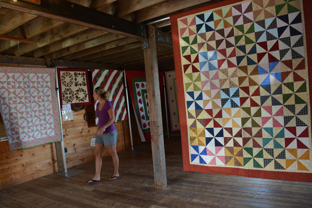 Inside Hallockville's Naugles Barn, where the Eastern Long Island Quilter's Guild exhibited a collection of homemade quilts