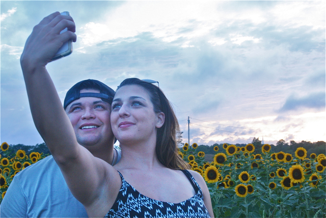 Dennis Aponte and his wife Angela Aponte of Ridge snap a selfie Wednesday evening.