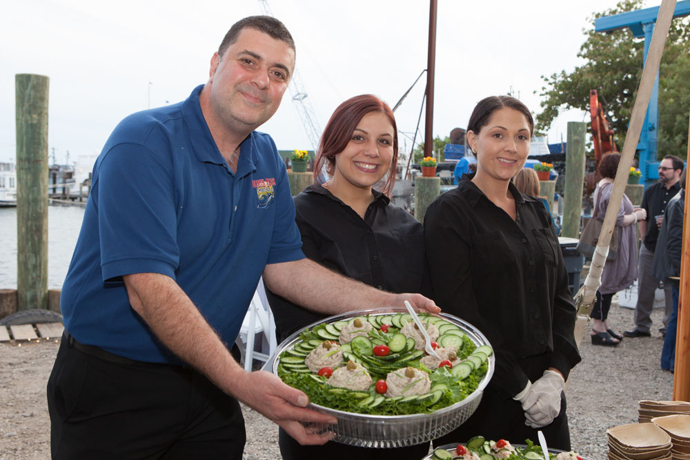 From left: Herman Demerciyan, Julie Flores, and Rhiannon Symonds of the North Fork Smoked Fish Company.