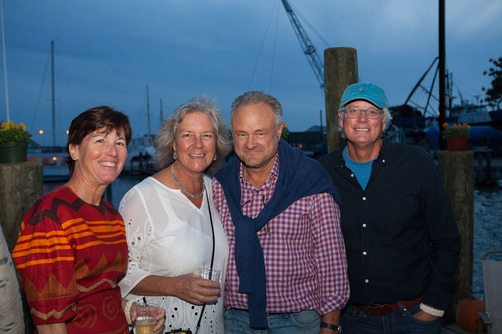 Maritime Festival Grand Marshal Pat Mundus, second from left, with friends.
