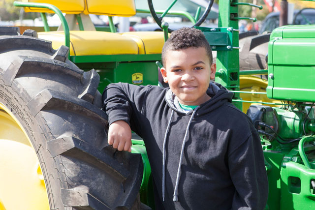 Tyler Booker, 10, of Riverhead dreams of someday riding on a tractor.