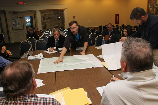 Brewster McCall shows off his plans to the Southold Town Planning Board. (Credit: Paul Squire)
