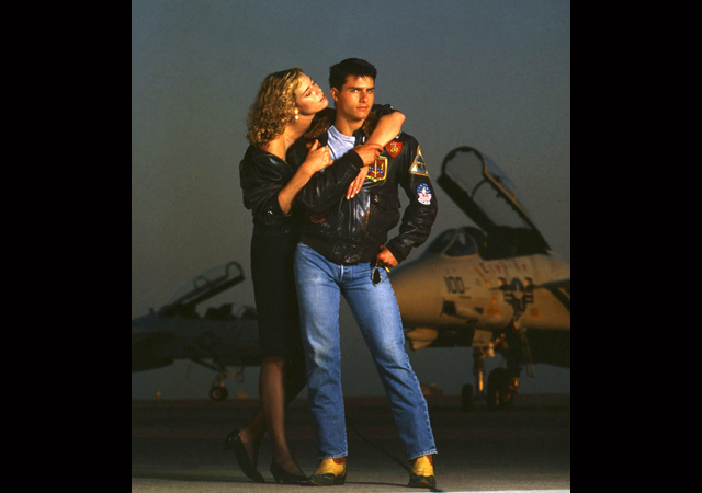 Kelly McGillis and Tom Cruise shoot the poster for "Top Gun", 1986 (Credit: EJ Camp)
