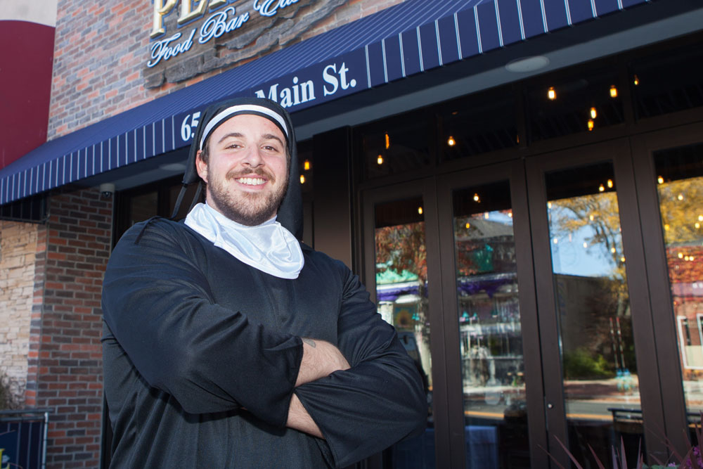 Mike Falcone of Pera Bell waits on tables wearing a nun's habit.