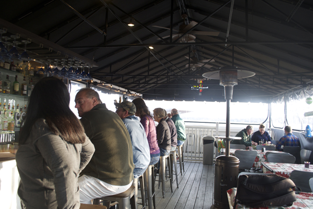 An unseasonably warm day at Deep Water Bar and Grille in Greenport.
