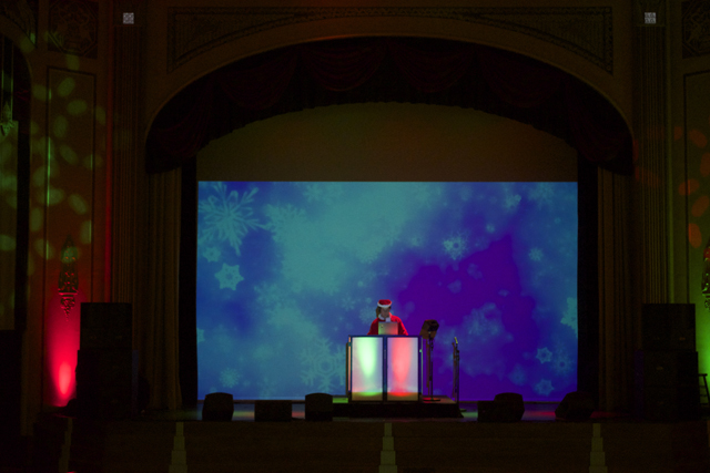 A DJ play tunes at the Suffolk Theater.