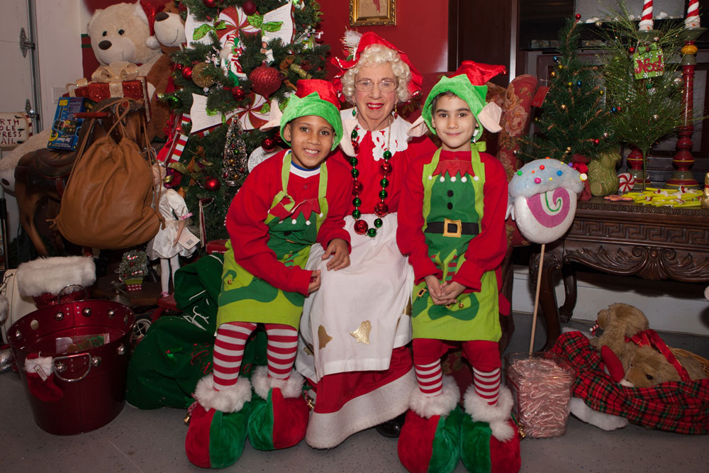 Mrs. Claus (Muriel Froenlich) with the elves.