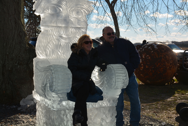 John and Pat Tirone of Oakdale pose on Santa's Throne.