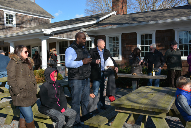 Spectators braved the cold weather to watch Daly at work.
