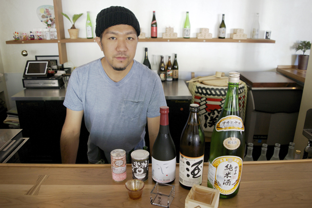 Stirling Sake owner and sake sommelier Yuki Mori behind the bar at his Greenport restaurant. (Credit: Vera Chinese)