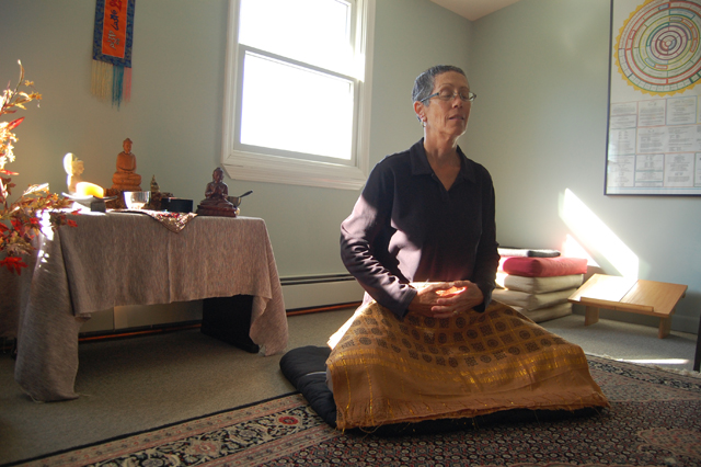 Charmaine Henderson meditating in her Cutchogue home. (Credit: Rachel young)