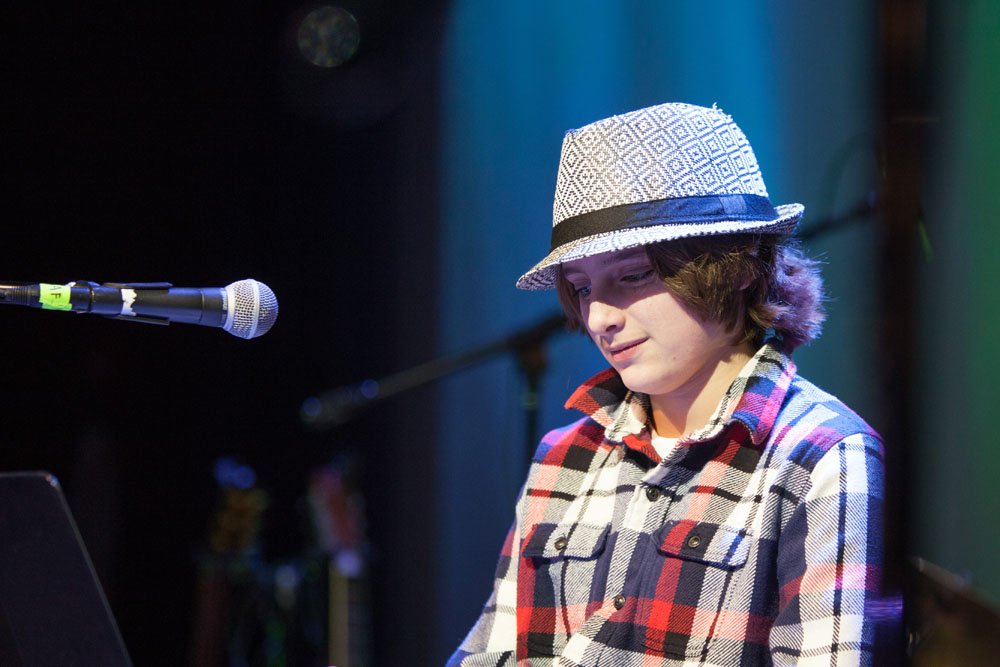 Cole Fortier, Andrew's 14-year-old son joins him onstage.