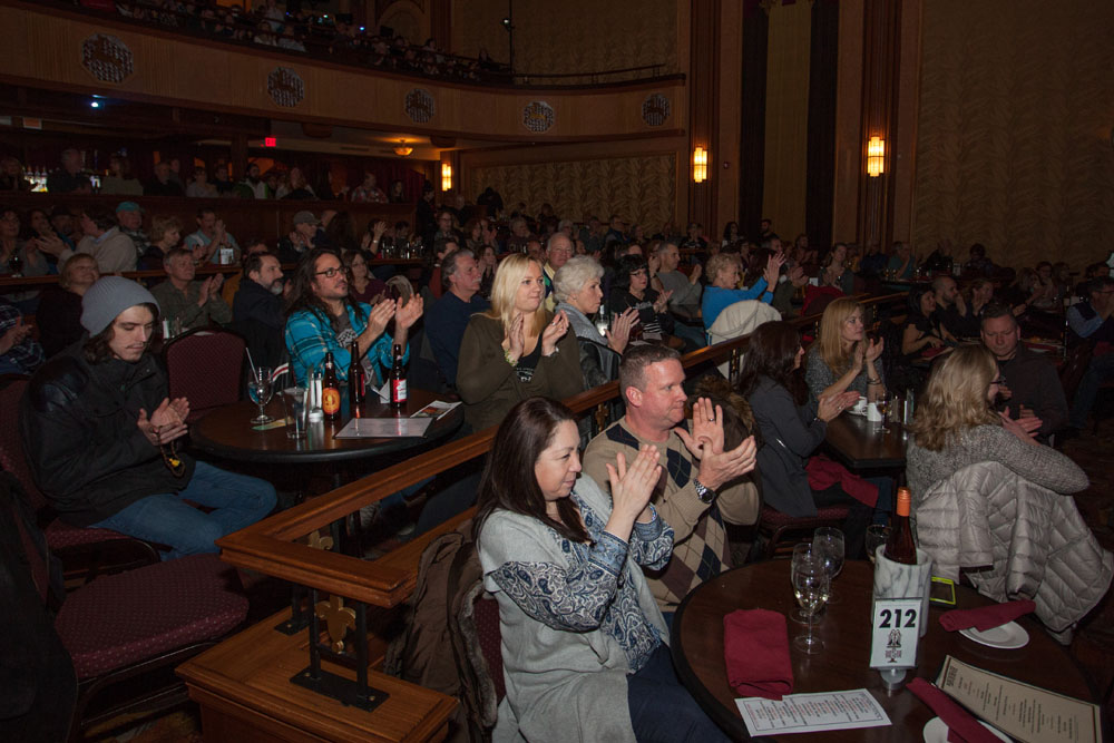 The audience applauds for Andrew and Cole Fortier.