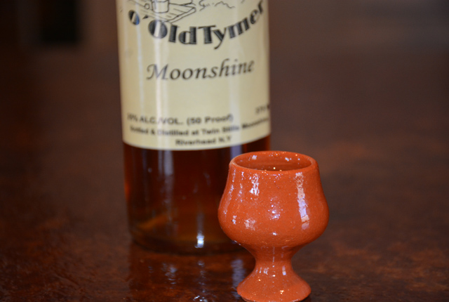 The moonshine is served in special clay cups, imported from Portugal (Credit: Monique Singh-Roy)