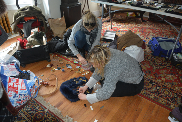 Trend Director Courtney Ignelzi and Stylist Sandy Armeni decorate a fur scarf with several pins to be worn for the cover shot.