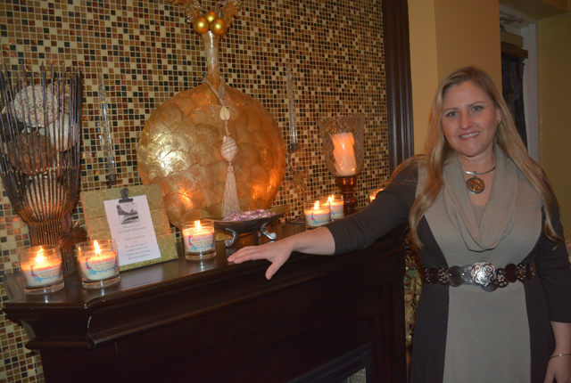 Spa Bellezza owner Tina Marie uses Treazured Scentz candles during massage treatments. (Credit: Monique Singh-Roy)