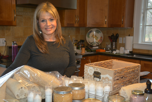 Shelter Islander Liz Melchar makes her entire Shelter Island Salts skin care line inside her home kitchen. (Credit: Monique Singh-Roy)