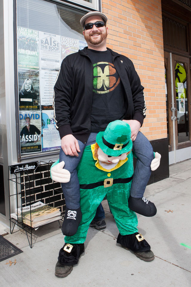 Ben Coggiano of Center Moriches gets a lift from a little friend.
