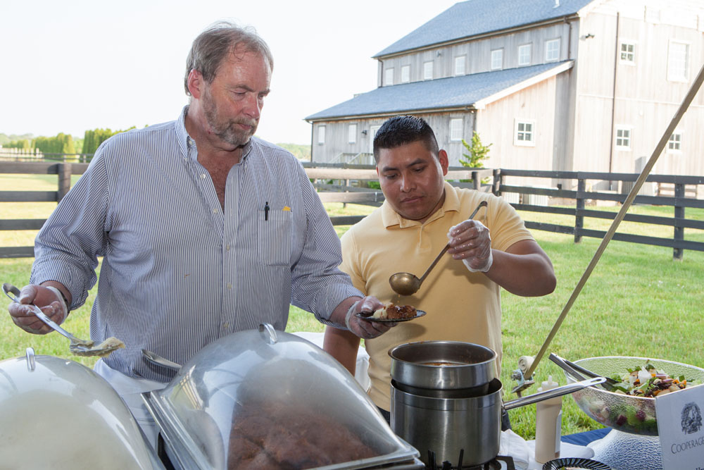 Kevin Carson, left, and Edgar Boch from The Cooperage Inn serve up four season meatloaf. (Credit: Katharine Schroeder)