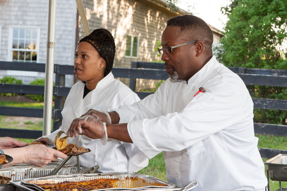 J & L's Chicken, Fish, and Ribs' owner Leroy Hines with Maddie Johnson. (Credit: Katharine Schroeder)