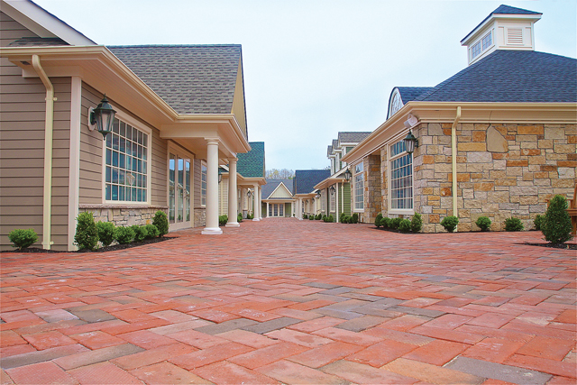 Twenty-eight shops ranging from 500 to 1500 square feet are connected by wide brick walkways laid in a herringbone pattern. (Credit: Barbaraellen Koch)