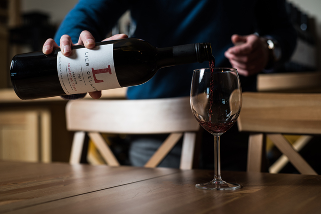 Mattis pours a glass of Lieb. (Credit: David Benthal Photography)