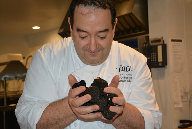 Executive Chef Marco Pellegrini inspects the truffle delivery to Caci North Fork (Credit: Monique Singh-Roy)
