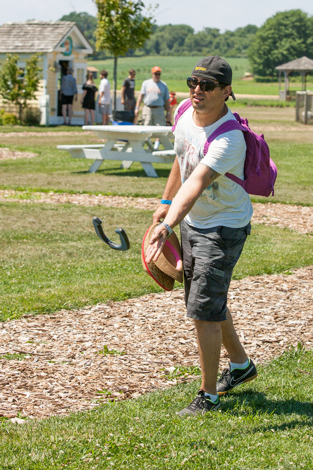 Marius Chiciu of Smithtown playing horseshoes. (Credit: Katharine Schroeder)