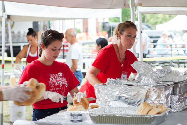 Brittany and Stacey Blake of Commack hard at work at the kielbasa booth.