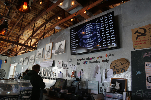 All the styles on tap are displayed on monitors in the Greenport Harbor tasting rooms. (Credit: Krysten Massa)