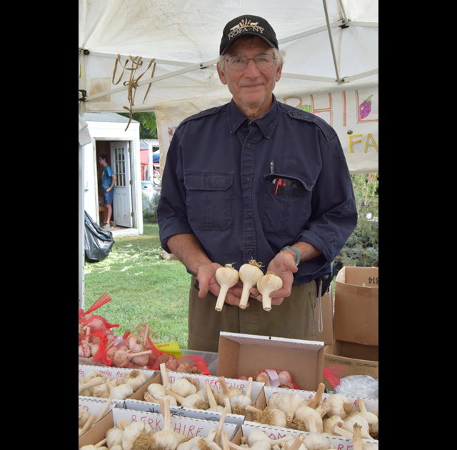 Farm Phil Barbato of Biophilia Organic Farm shows offs some Jumbo Musics.