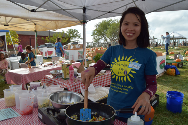 Garden of Eve staffer Nhanh Nguyen whips up some garlic pasta.