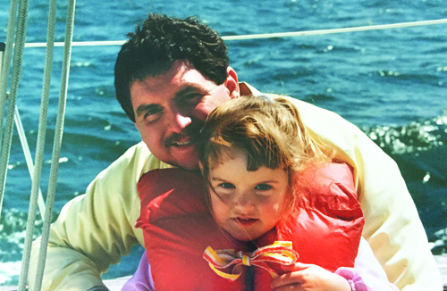 Callie Martino as a child with her father, James Brennan, on his boat in Greenport. (courtesy photo)