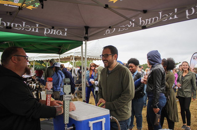 Greg Martin, owner of Long Ireland Beer Co., cracks jokes with Matt Gulotta of Westbury.