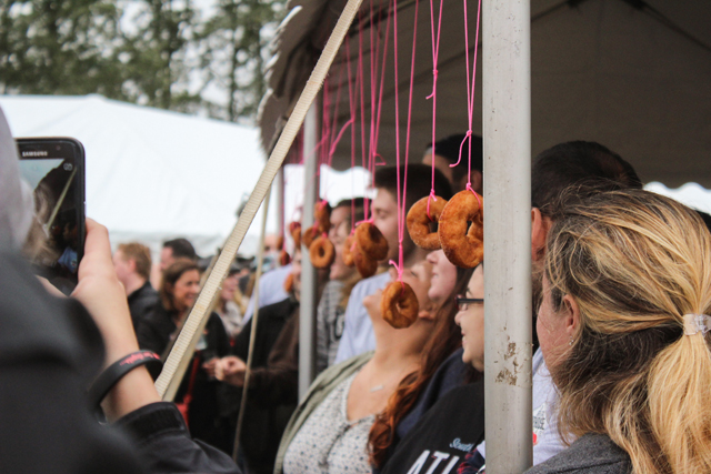 Contestants anxiously lined up to await the donut eating contest.