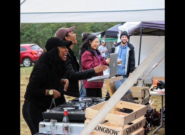 DJ Hvnlee (left) and Brielle Liverman (right) entertain the crowd in the Strongbow Hard Cider tent.