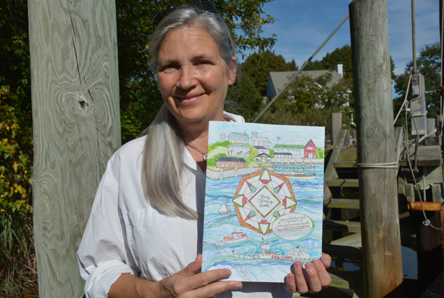 Meg Bennett holds a copy of her Glory coloring book (Credit: Monique Singh-Roy)